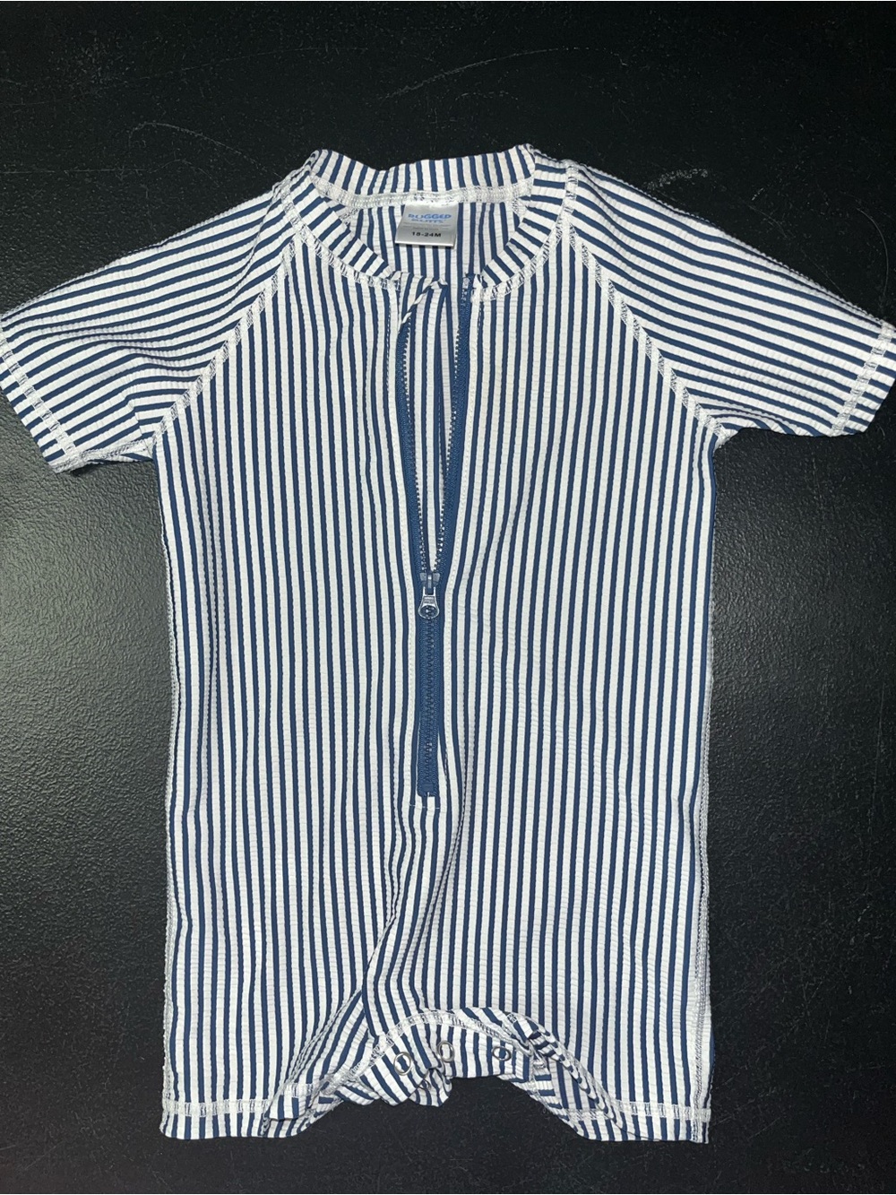 Rugged Butts navy and white striped short sleeve one piece toddler swimsuit
